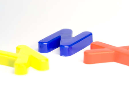 Colorful letters on white background with space for your textの写真素材