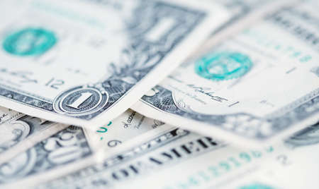 US dollars background , artistic processed and toned photo with shallow DOF and space for your textの写真素材