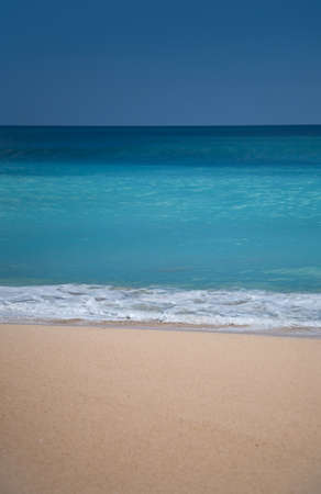 Beautiful surfing sand beach on sunny summer day
