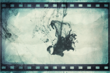 High detailed grunge film frame with space for your text or image.の写真素材