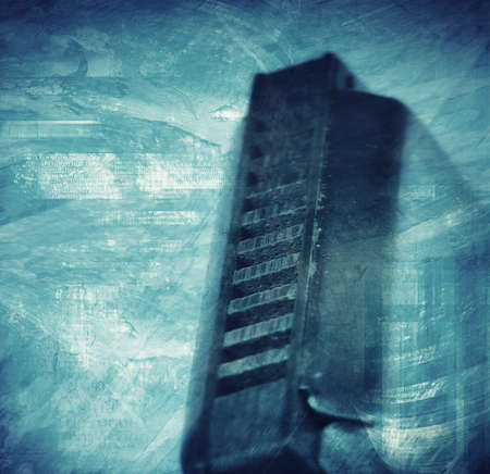 Blues harmonica grunge style textured artistic backgroundの写真素材