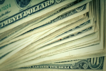 Money background - US dollars background, reto style toned photo with shallow DOFの写真素材