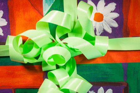 Green gift with  bow and ribbon for thisChristmasの写真素材