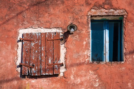 Old grunge wooden window on abandoned houseの写真素材