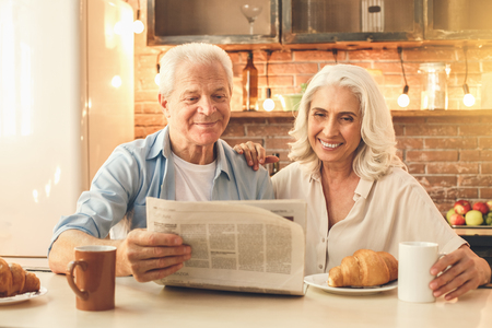 Senior couple cooking together at home loveの写真素材