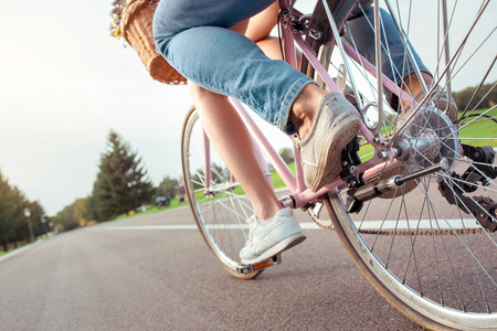 Couple riding bicycle together active lifestyle conceptの写真素材