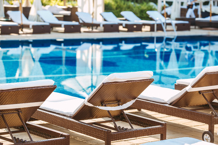 Swimming pool leisure rest loungers no peopleの写真素材