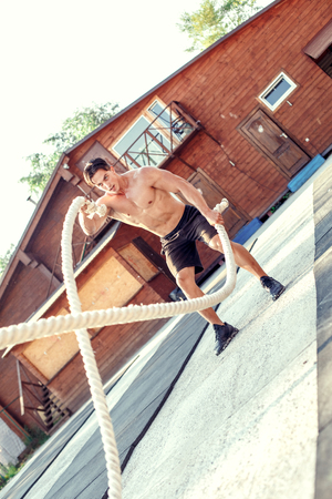 Young man exercise outdoors sport conceptの写真素材