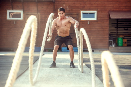 Young man exercise outdoors sport conceptの写真素材