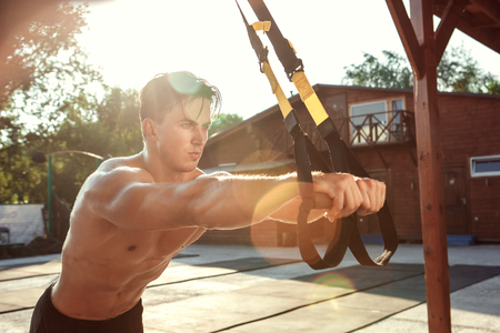 Young man exercise outdoors sport conceptの写真素材