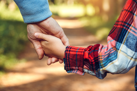 Grandfather and grandson together outdoors family conceptの写真素材