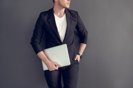 Young blonde business man isolated studio conceptの写真素材
