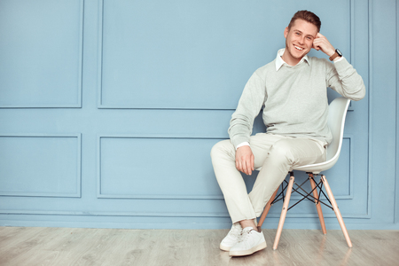 Young man freestyle modern casual look studio conceptの写真素材