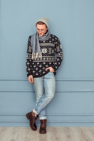 Young man holiday christmas style studio conceptの写真素材