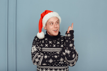 Young man holiday christmas style studio conceptの写真素材