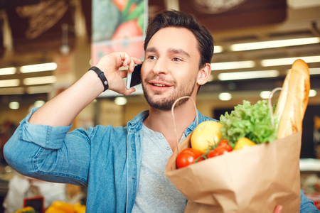 Person shopping at the grocery shop food conceptの写真素材