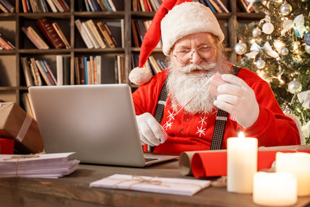 Santa Claus in the library christmas new year conceptの写真素材