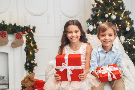 Little brother and sister family christmas conceptの写真素材