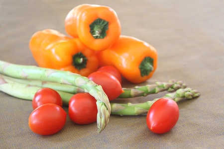 Combination of colorful fresh vegetables on a tableの写真素材