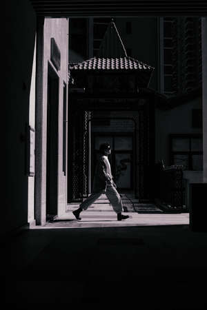 Portrait fashion, business, women, light and shadow, cold, happy, black and white, emotional outdoorの写真素材