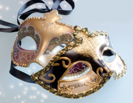 Two carnival Venetian mask with shining glow of starsのeditorial素材