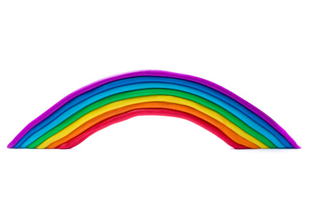 Plasticine rainbow on a white background.の写真素材