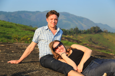 Group of tourists rests after climbing. The concept of a healthy lifestyle.の写真素材