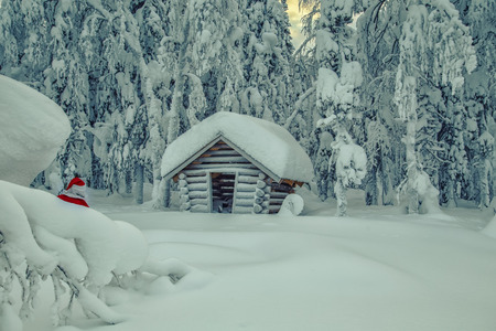 Authentic Santa Claus in Lapland. Magnificent snow-covered landscape.の写真素材
