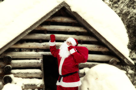 Joyful Santa Claus in his house. The home of Santa Claus at the North Pole.の写真素材