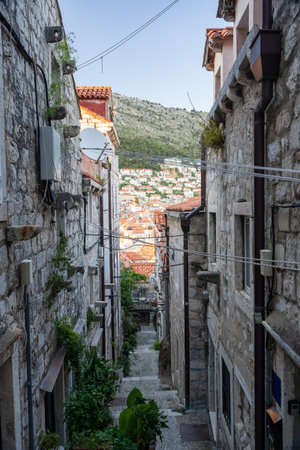 View of Dubrovnik old town through alleyway in Croatia, roofsの写真素材