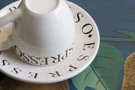 Espresso cup and saucer on a serving tray