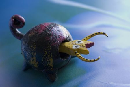 cute wooden tortoise painted by children in Mexicoの写真素材