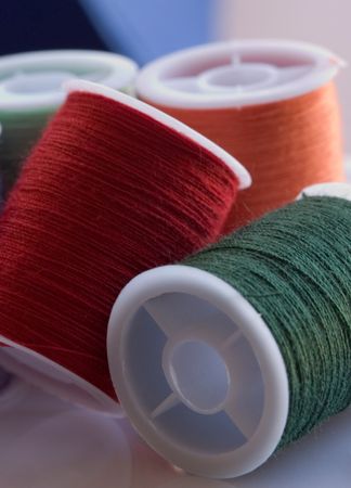 spools of colorful sewing threads