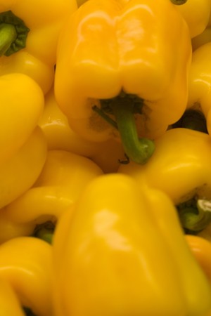 yellow bell peppers close upの写真素材