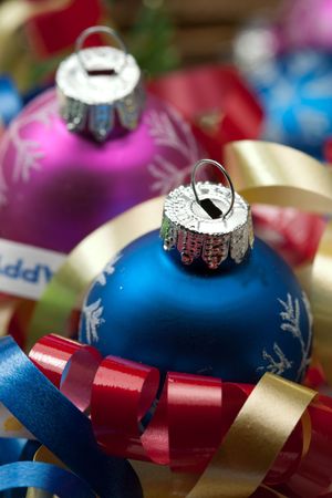 two xmas treen ornaments and holidat ribbonsの写真素材