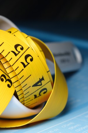 yellow measuring tape and measuring spoon の写真素材