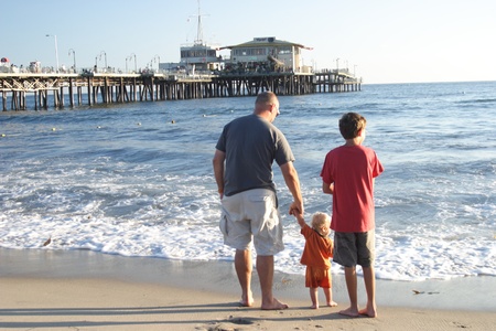 family enjoying a nice day on the beach in Santa Monicaのeditorial素材