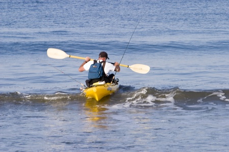 A sea kayaker paddling out for some funのeditorial素材