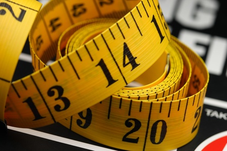 Yellow tape measurement on counter top