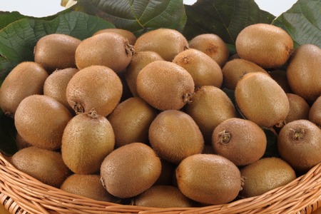 Ripe kiwi on basketの写真素材