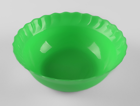 Red round plastic deep dishの写真素材