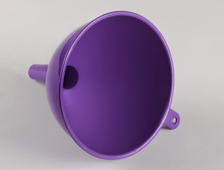 Purple plastic kitchen funnel liquidの写真素材