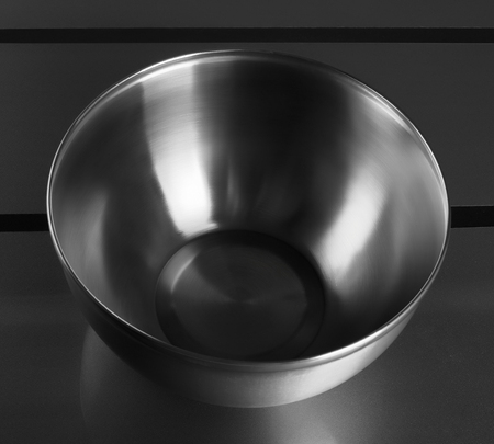 Kitchen mixing deep stainless steel on gray tableの写真素材