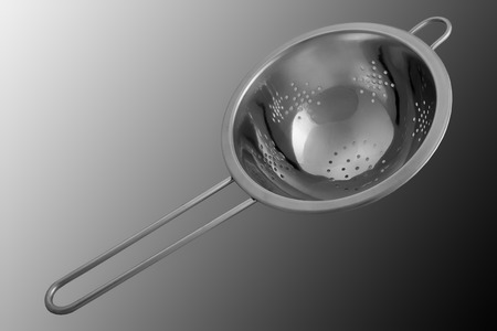 Empty sieve strainer stainless metal with handle. Front viewの写真素材