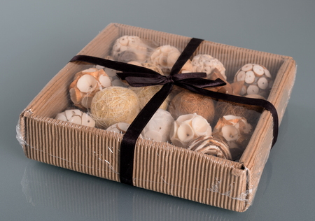 Assortment of dry flowers in plastic transparent boxの写真素材