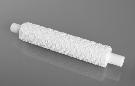 Pattern embosser on gray backgroundの写真素材