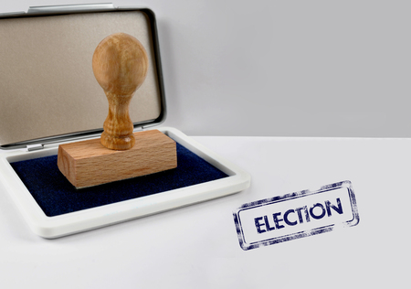Wooden stamp on a desk ELECTIONの写真素材