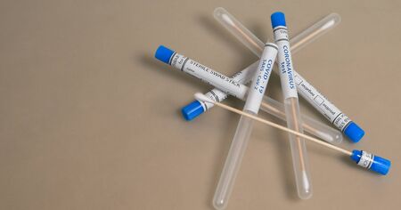 Sterile swab stick tests for COVID-19 nCoV-2 Coronavirus on the tableの写真素材
