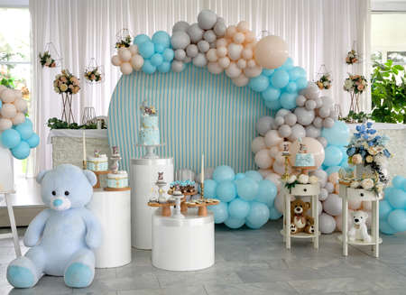 Happy Birthday! Children's decoration with glowing lights, birthday garland, different color of balloons. Decorated photo zone. Festive decorative elements, photo areaの写真素材
