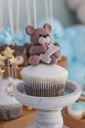 Decoration details of a birthday cake made for little boy girl, in blue and white. Teddy bear Birthday cakes.の写真素材